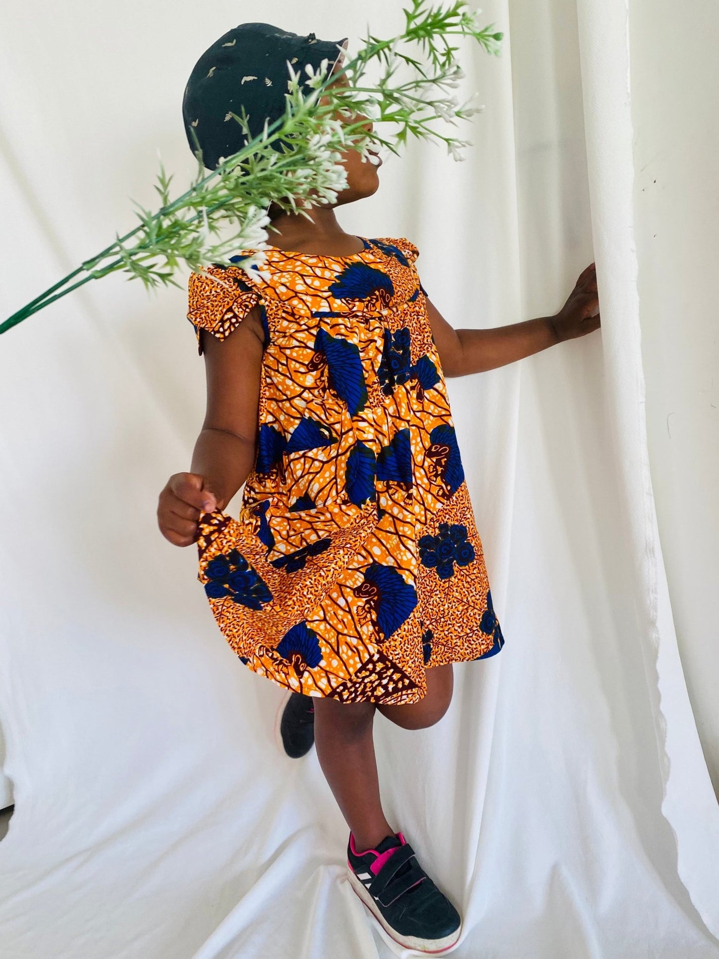 Robe enfant orange en wax fleurie - Kaysol Couture