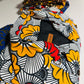 Trench en wax Fleur rouge et jaune / Collection Iconique / Taille Ajustable