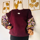 Damen-Sweatshirt mit Wax-Stoff / Bordeaux - Ärmel mit glitzerndem Bogolan-Muster / Neu