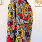 Trench en wax Fleur rouge et jaune / Collection Iconique / Taille Ajustable