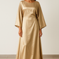 Robe Nayla longue en satin brillant coupe chauve-souris avec ceinture torsadée, idéale pour mariage, demoiselle d’honneur, cérémonie ou tenue Aïd – Kaysol Couture.