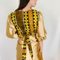 Dos  de la tenue cache cœur de Kaysol couture, une robe de cérémonie tendance, robe convertible beige champagne, vêtements africain chic