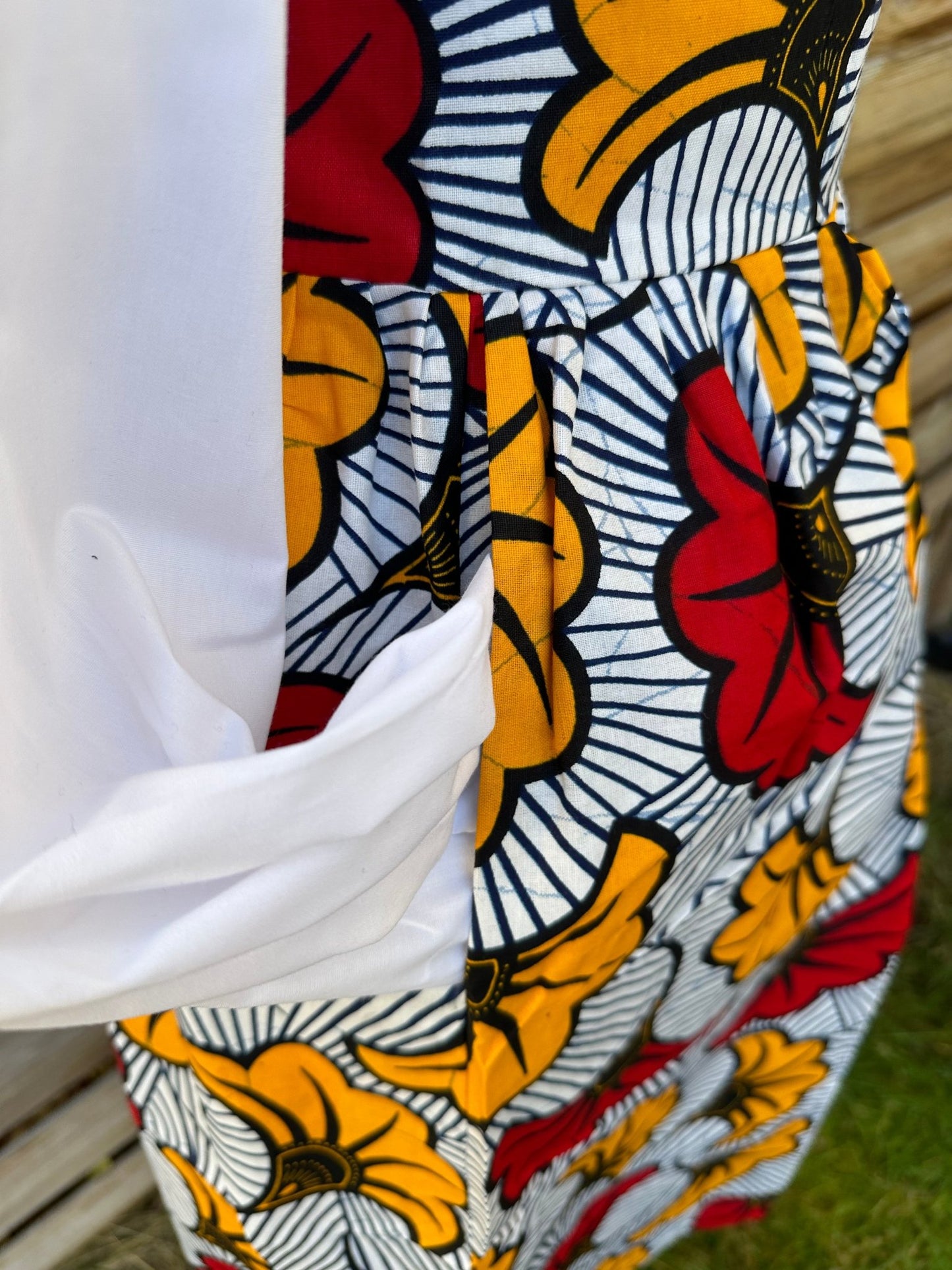 Jupe en wax Mi-longue fleurs de mariage rouges et jaunes - Avec poches - Kaysol Couture
