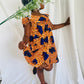 Robe enfant orange en wax fleurie - Kaysol Couture