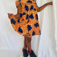 Robe enfant orange en wax fleurie - Kaysol Couture